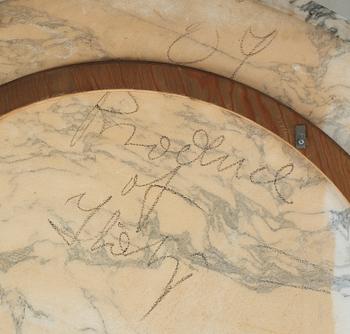 An Eero Saarinen 'Tulip' marble top dining table, Knoll International, USA.