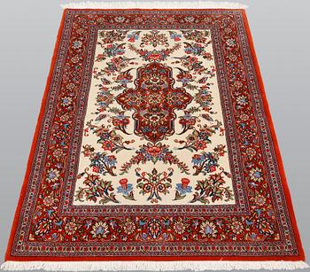 A Ghom rug, ca 155 x 105 cm.