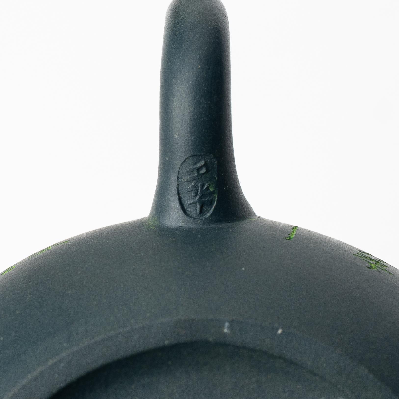 A group of three yixing teapots and a box with cover, China, 1970/80s.