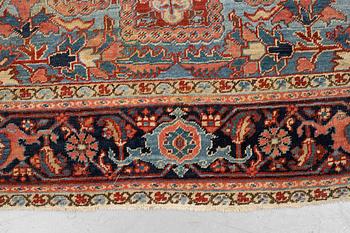 A carpet, semi-antique Heriz, ca 376-373,5 x 267 cm.