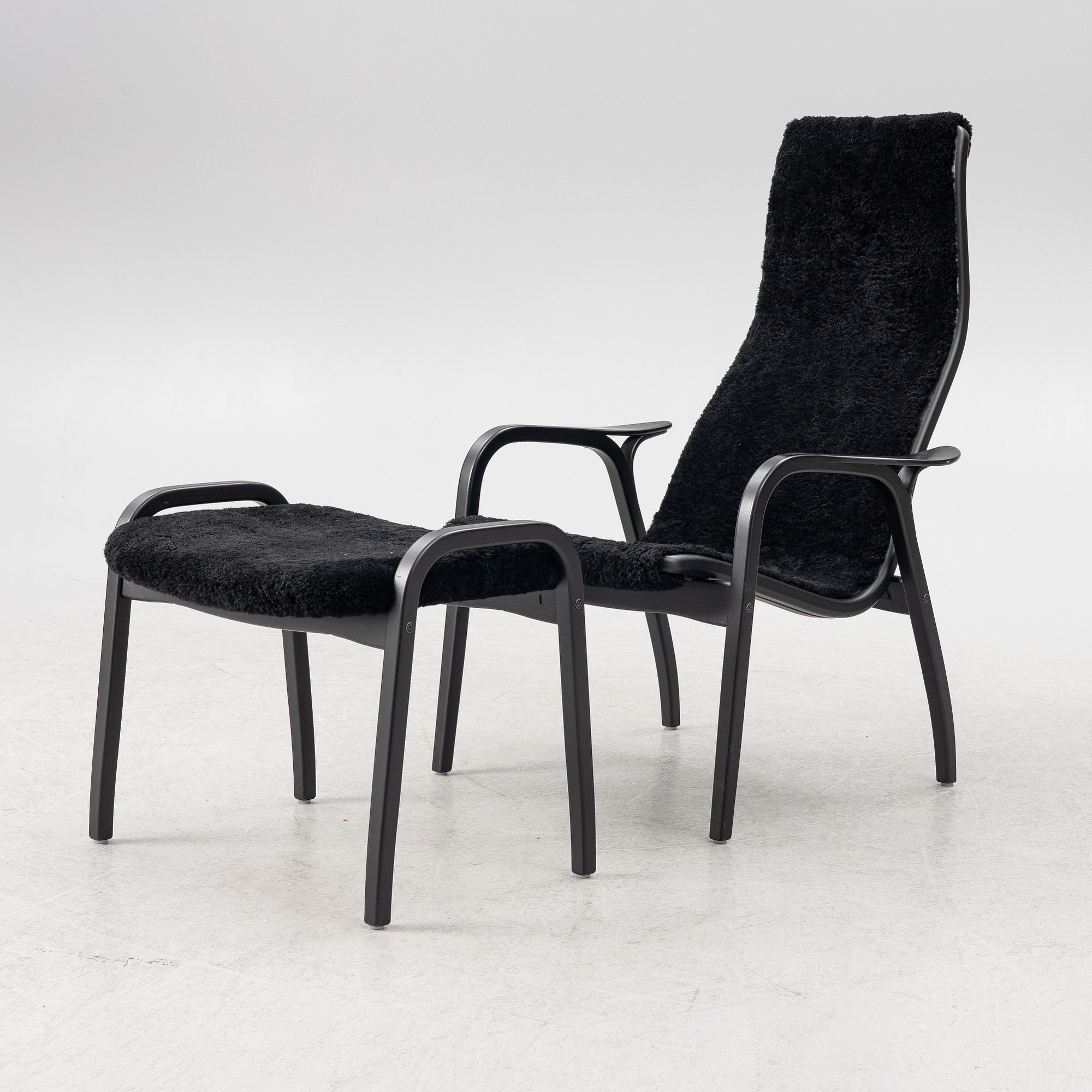 Yngve Ekström, a  'Lamino' easy chair with foot stool, Swedese, 2018.