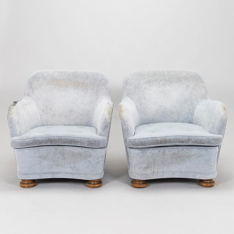 A pair, ofmid-20th century armchairs.