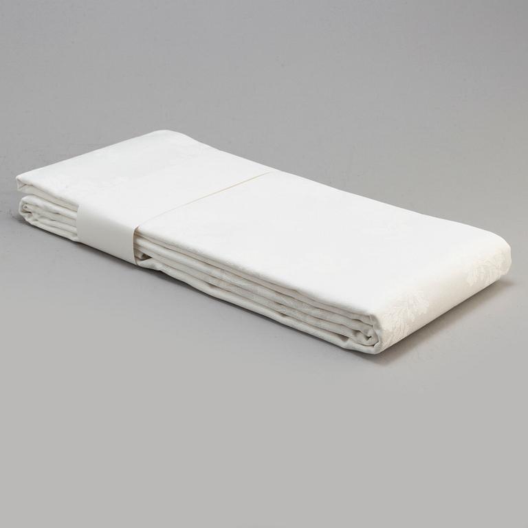 Four damasque table cloths from Georg Jensen Damask. 'The Royal Anniversary and World Scout Centennial Present'.