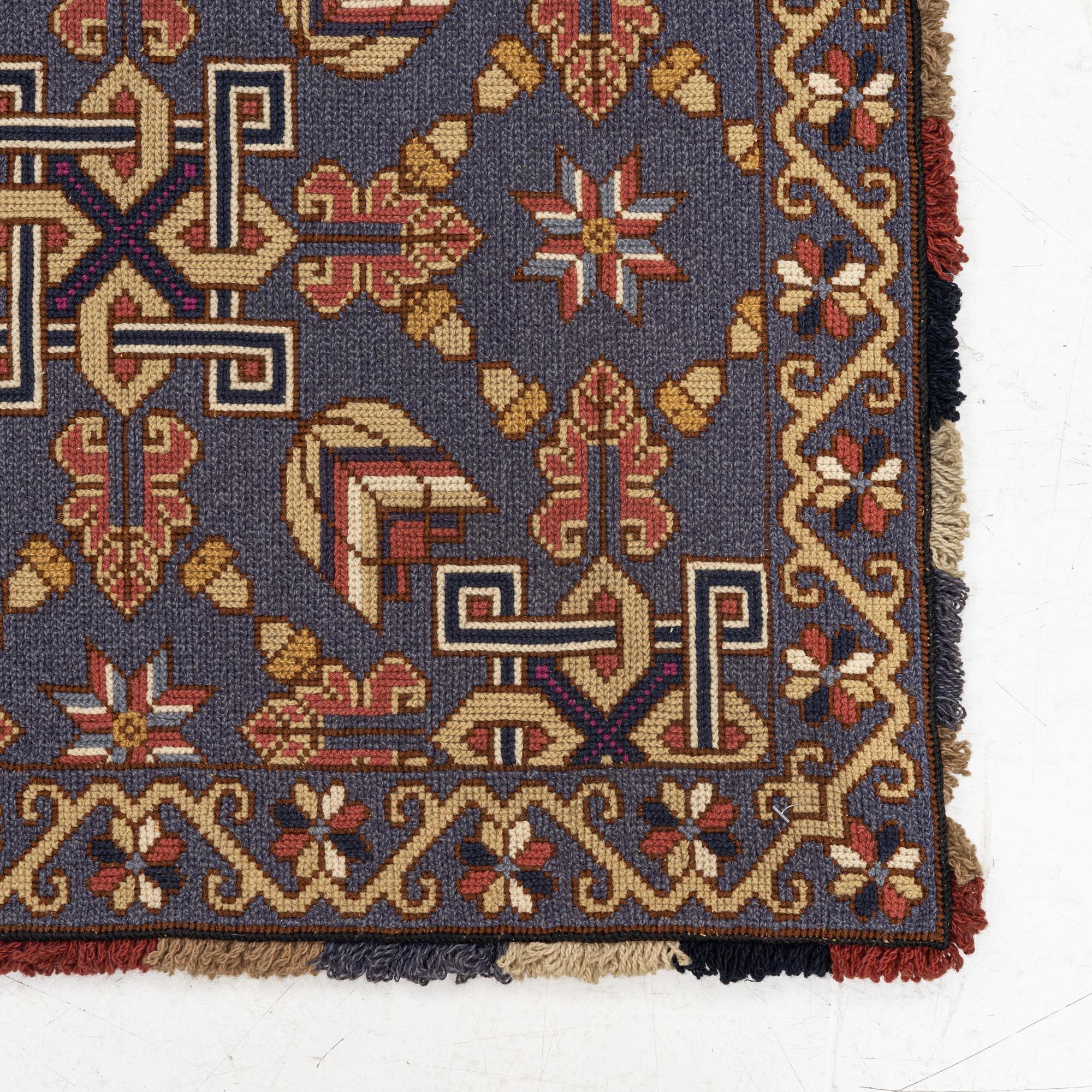 A twizt stich bench cushion from Scania. C 187 x 79 cm Circa 1900.