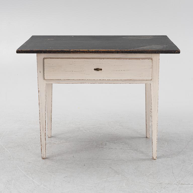 A painted table, 19th Century.
