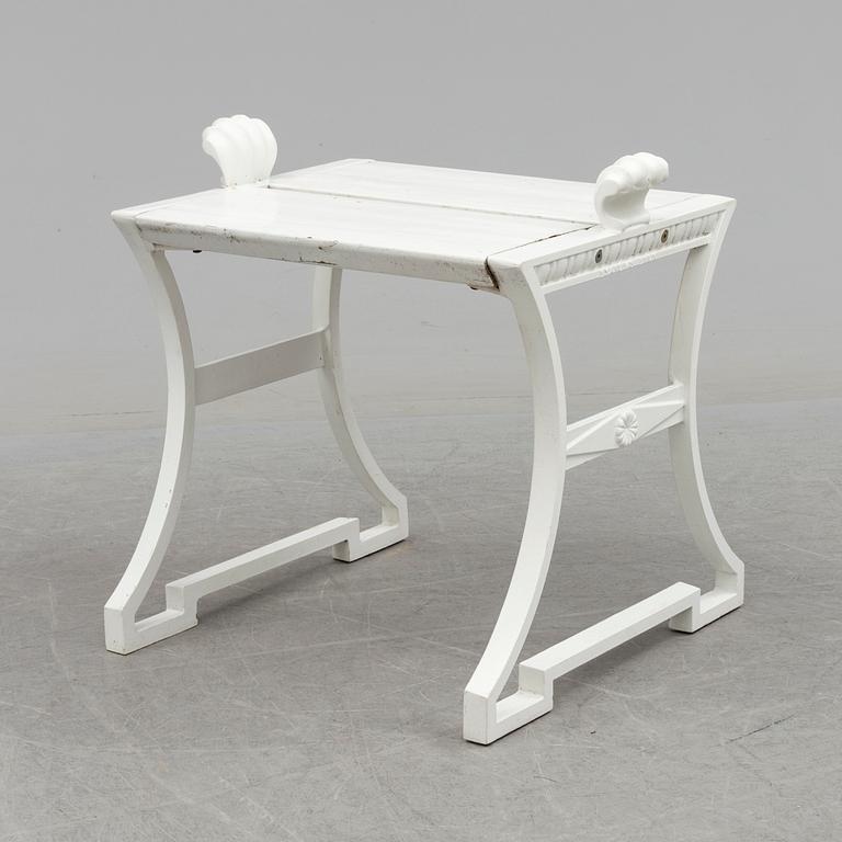 A "Sneckan" bench by Folke Bensow for Byarums bruk in the late 20th century.