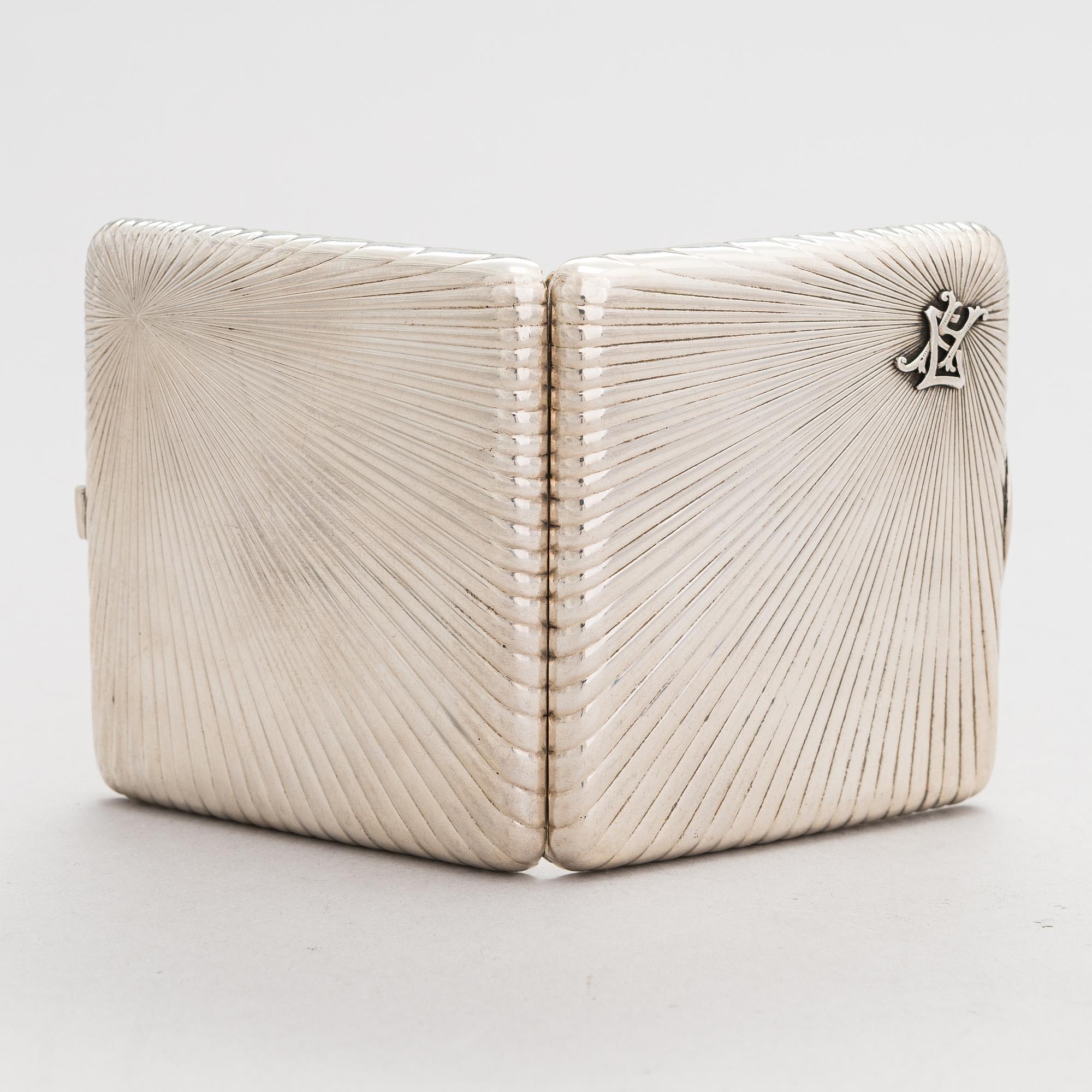 A silver cigarette case, maker's mark of Johan Allenius, Saint Petersburg, Russia 1898.