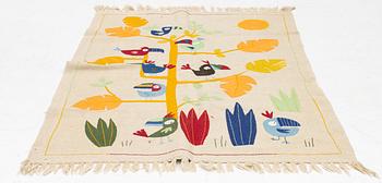A hand-embroidered Kelim rug, c. 125 x 121 cm.