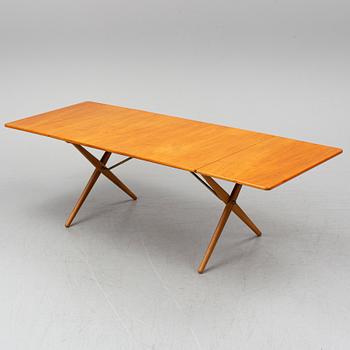 HANS J WEGNER, a teak and oak drop-leaf dining table, Andreas Tuck, Denmark 1950'-60's.