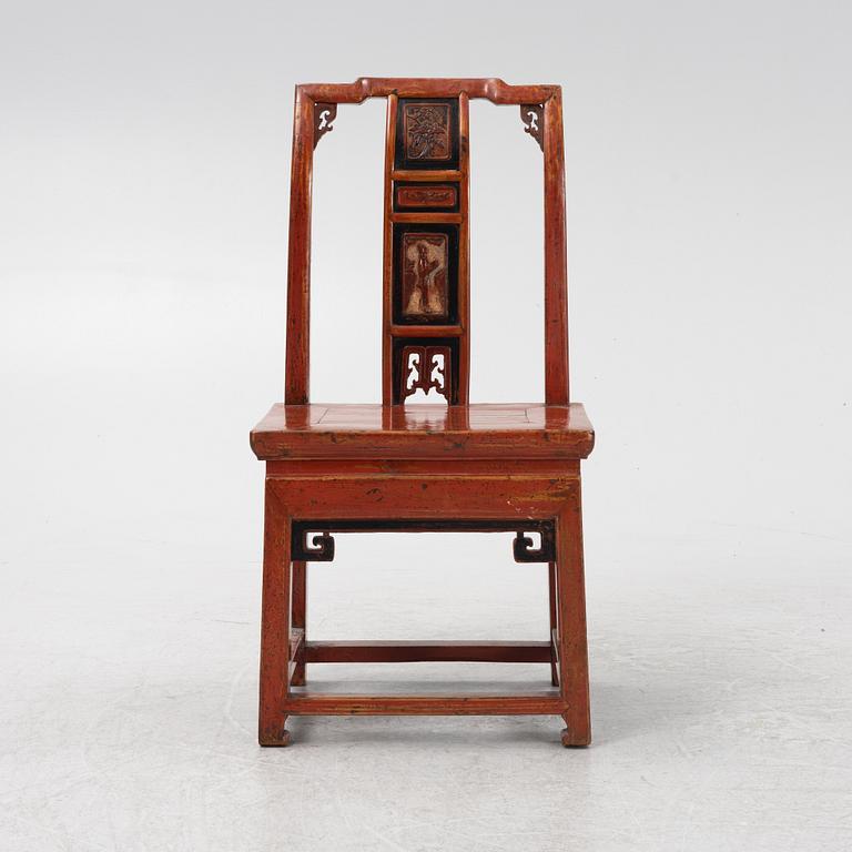 A red-lacquered chair, China, Qingdyansty, late 19th century.