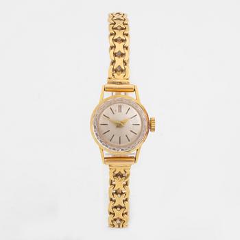 18K gold ladies watch.