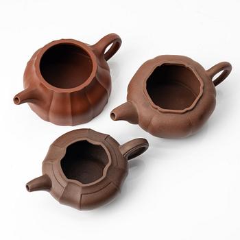 A group of three yixing teapots, China, 1980s.