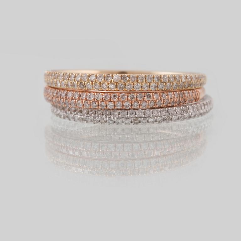 RINGAR, 3 st, 14K trefärgat guld med briljantslipade diamanter totalt ca 0.54 ct. Vikt 3,4 gram.