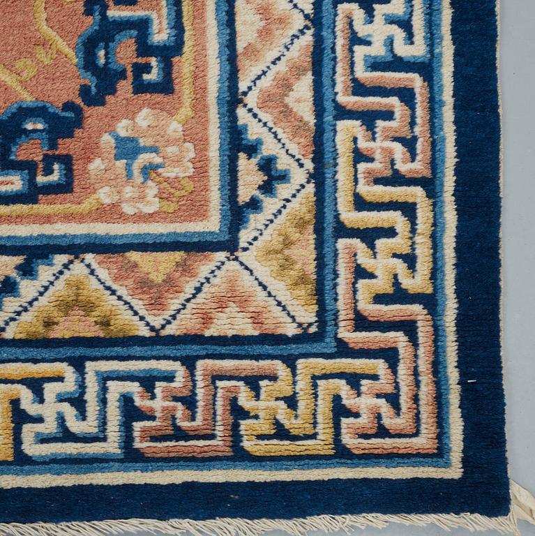 A CARPET, a semi-antique Ningxia, ca 197 x 127 cm.