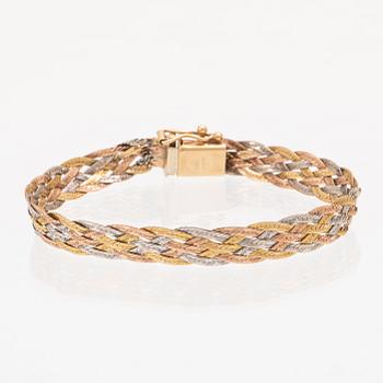 A 14K gold bracelet.