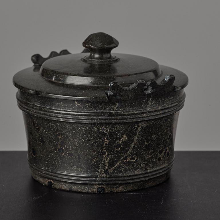 A serpentine stone butter box and cover circa 1800.