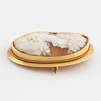 Two brooches, 18K gold with carved shell cameo.