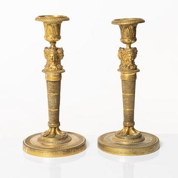 A matched pair of candlesticks, Empire, France, first half of the 20th century.