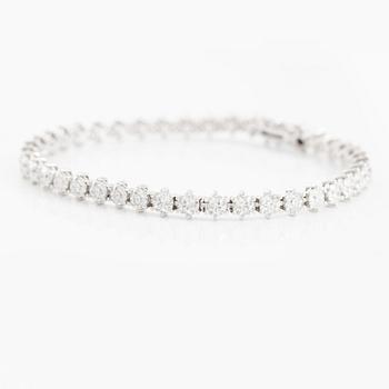 Tennis bracelet, 18K white gold with fancy-cut diamonds.