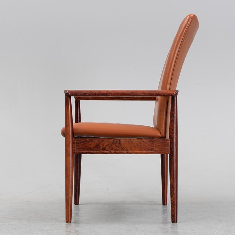 Finn Juhl, a rosewood easy chair, from Cado, Denmark, 1960's/70's.