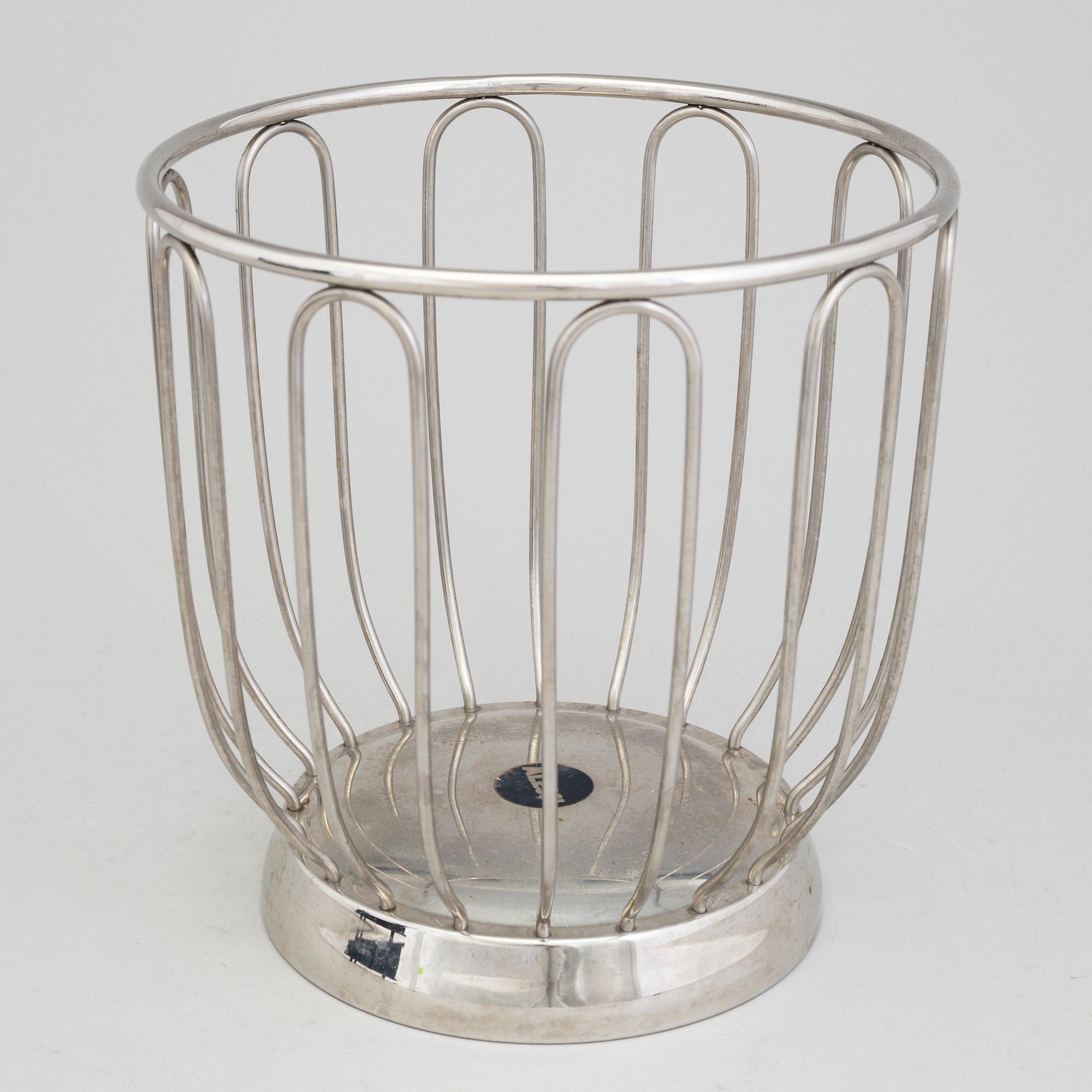2 pieces of Alessi stainless steel table ware.