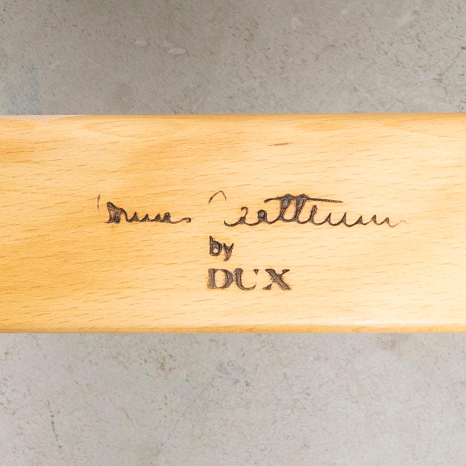 Bruno Mathsson, fåtölj med fotpall "Pernilla" DUX sent 1900-tal.