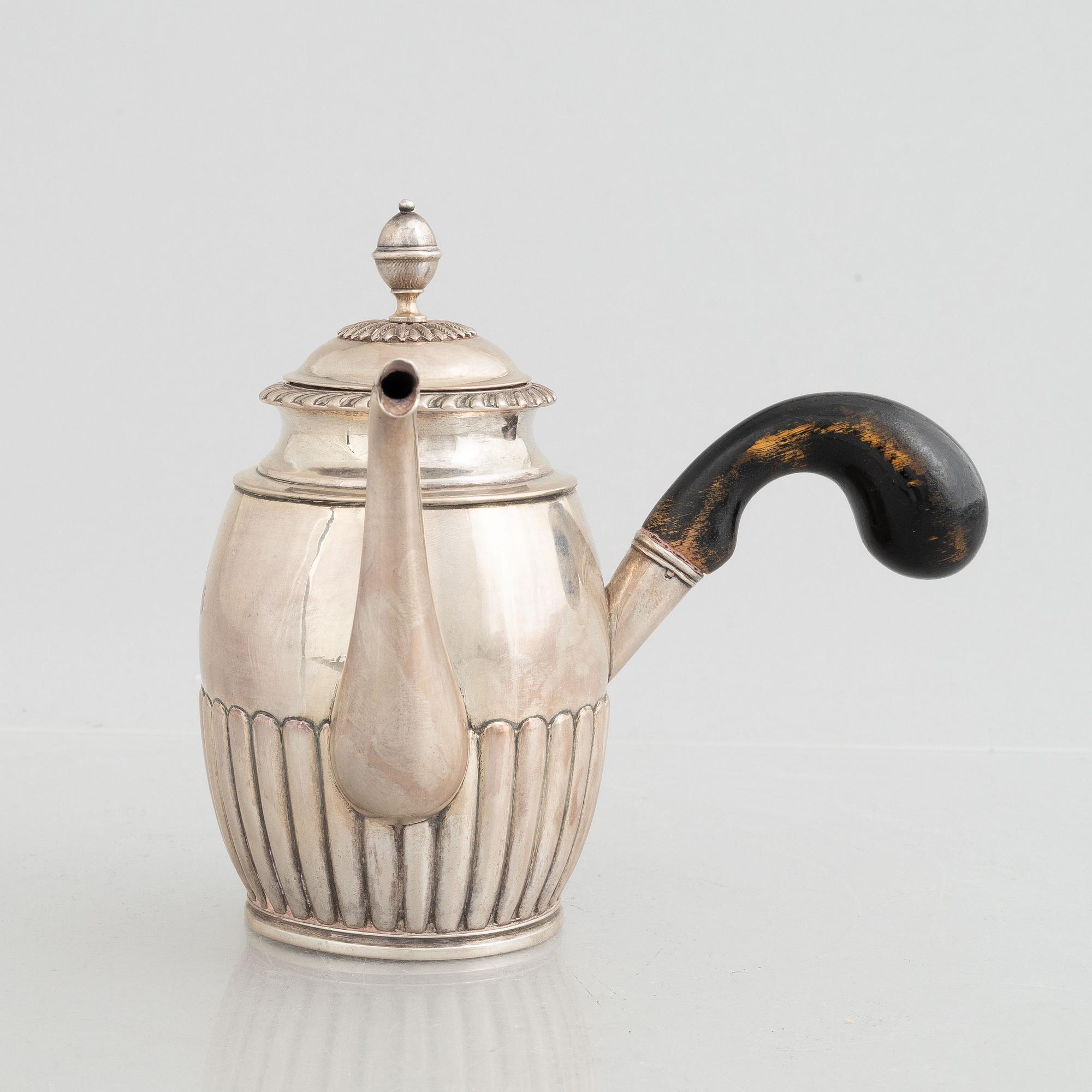 A Swedish Empire silver coffee pot, mark of Gustaf Folcker, Stockholm 1830.