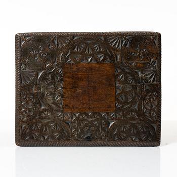 A carved wooden box, Sweden, 19th century.