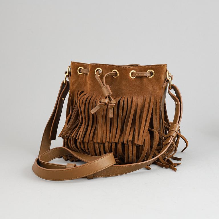 Yves Saint Laurent, a suede fringe handbag.