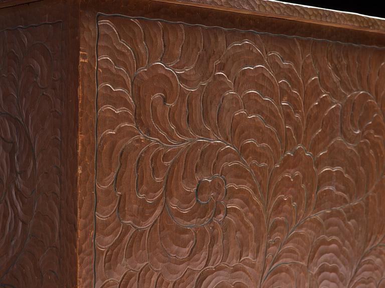 Otto Wretling, attributed to, an Art Nouveau pine 'partner's desk' with two chairs, Sweden, early 20th century.