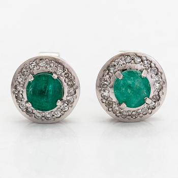 A pair of ca. 13K white gold earrings with emeralds and diamonds totaling approx. 0.36 ct.