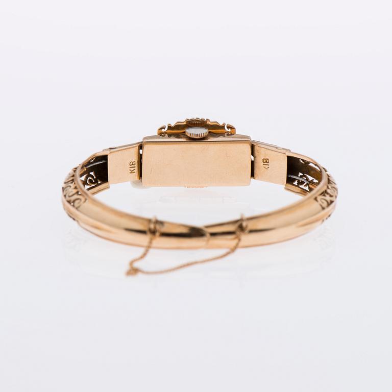 ARMBAND / ARMBANDSUR, 18K guld, åttkantslipade diamanter.
