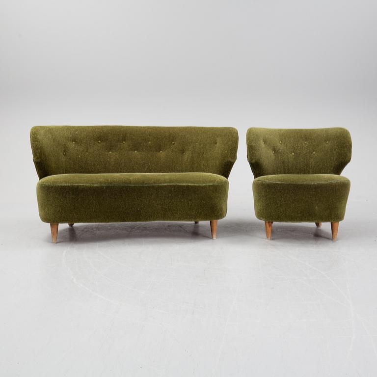 A sofa and easy chair, 1940s/50's.