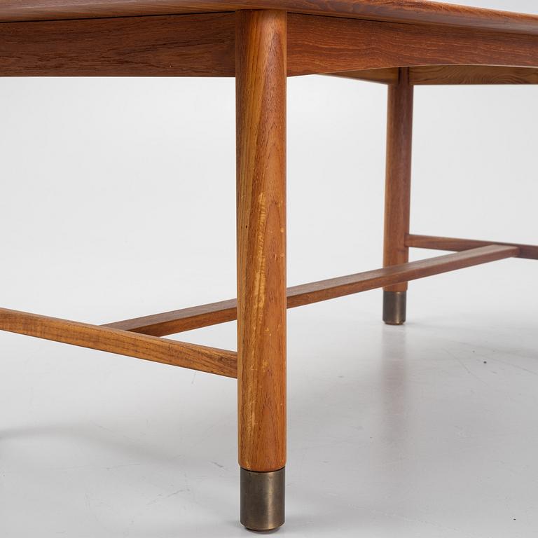 A Teak Veneer Coffee Table, mid 20th century.