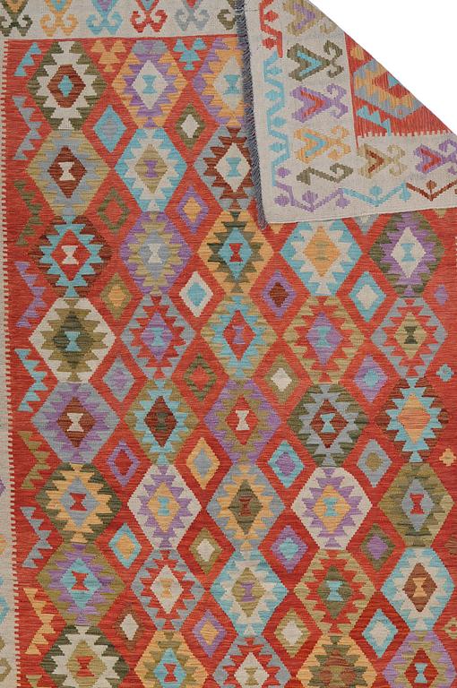 A RUG, kilim, ca 290 x 207 cm.