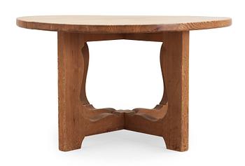 A stained pine dining table, attributed to Axel Einar Hjorth, Nordiska Kompaniet, 1930's.