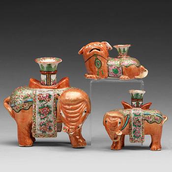 652. A group of Canton famille rose candle sticks, late Qing dynasty, early 20th Century.