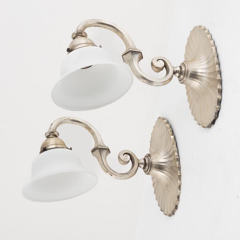 A pair of silver-plate wall lamps, C.G. Hallberg, 1920's.