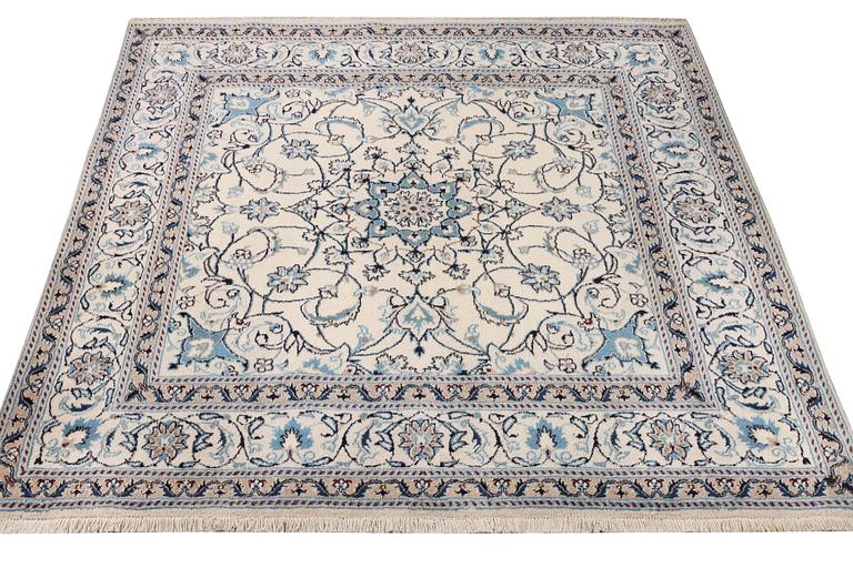 A Nain crug, part silk, c. 200 x 193 cm.
