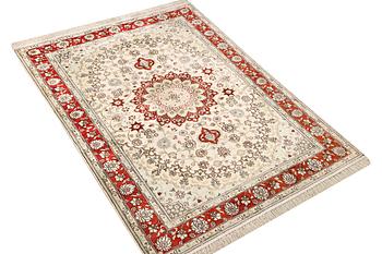 A carpet, Turkey, silk, c. 180 x 120 cm.
