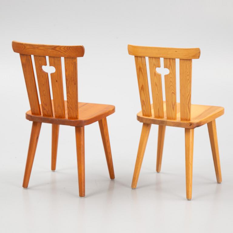 A set of ten chairs and a table, mid 20th Century.