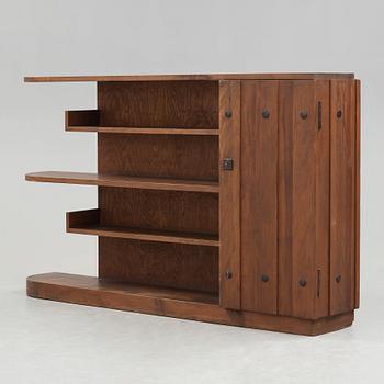 Axel Einar Hjorth, An Axel Einar Hjorth 'Lovö' stained pine bookshelf, Nordiska Kompaniet Sweden 1930's.