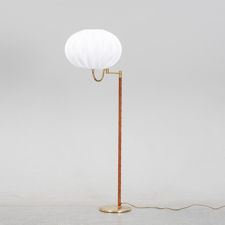 A brass floor light from EWÅ, second half of the 20th Century.