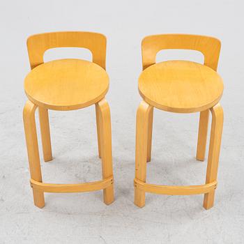 Alvar Aalto, two model 'K65' bar stools, Artek, Finland.