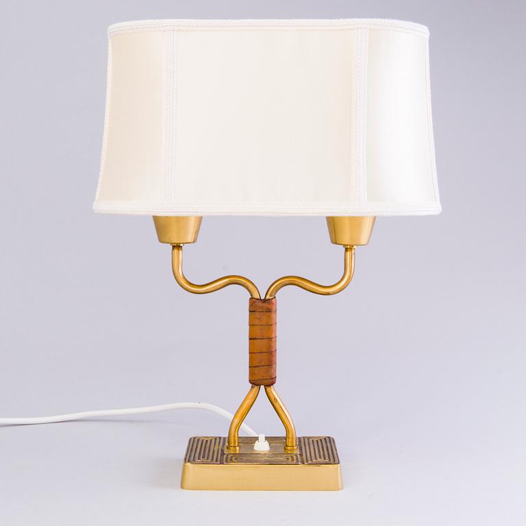 SONJA KATZIN, A 1940s brass table light from Asea, Sweden.
