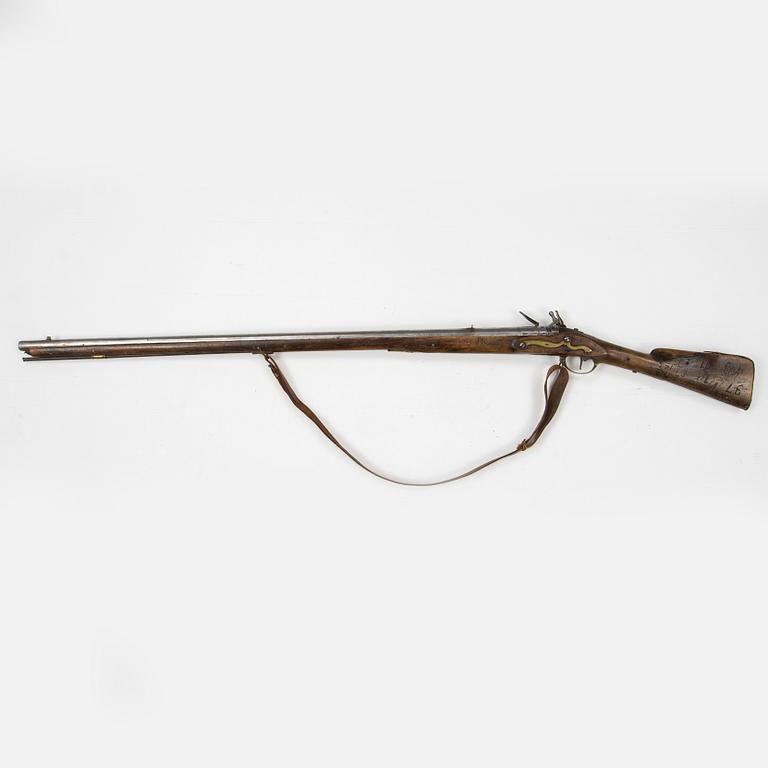 A British mid 18th Century flintlock musket.