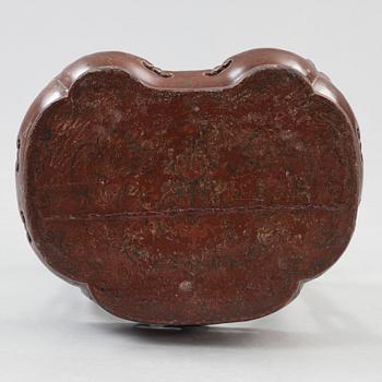 A red and gold lacquer stool, Qing dynasty presumably 18th century.