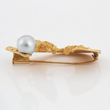 BJÖRN WECKSTRÖM, brooch, "Solskeppet",18K gold and pearl.