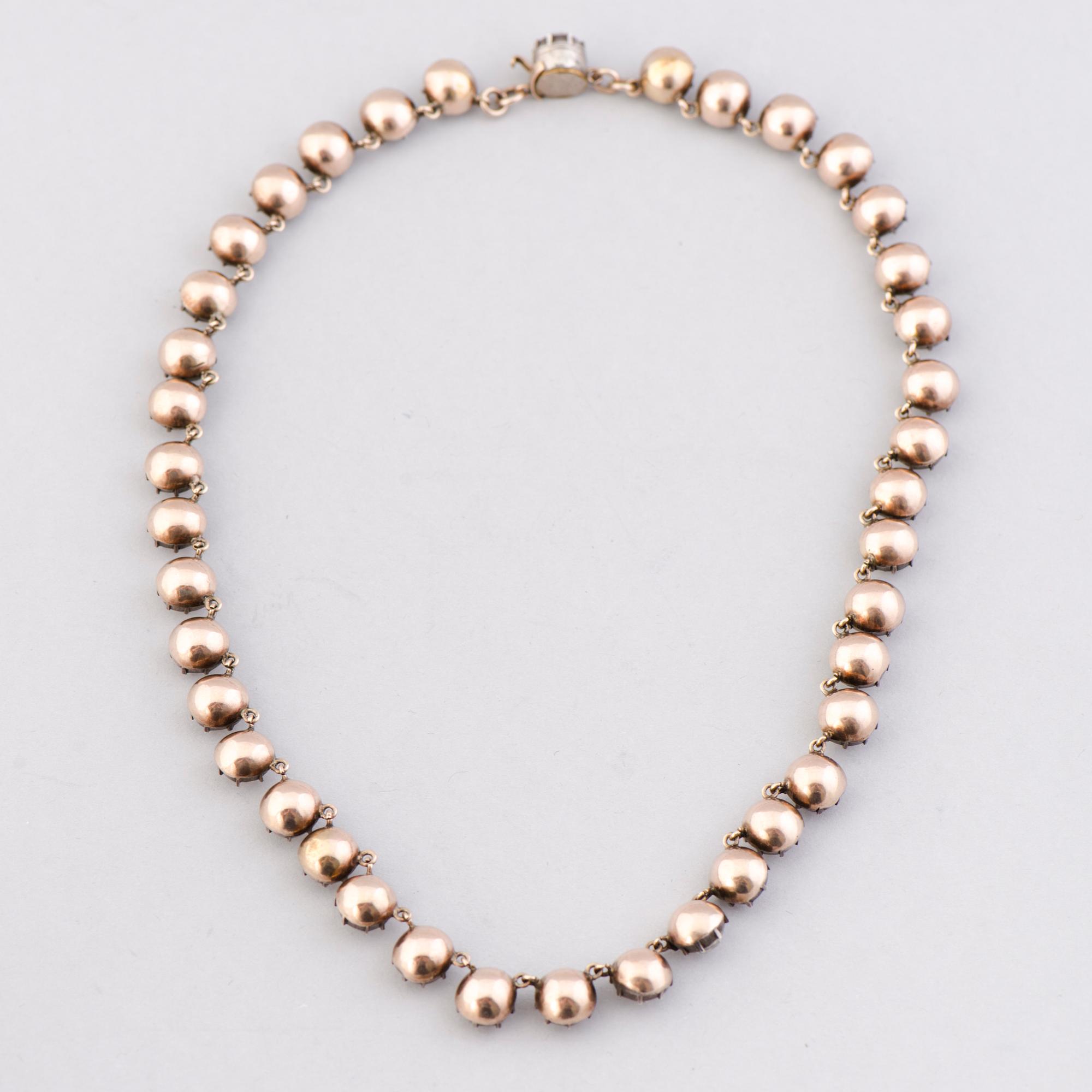 A  RIVIERE NECKLACE, facetted glass, silver, 19th century.