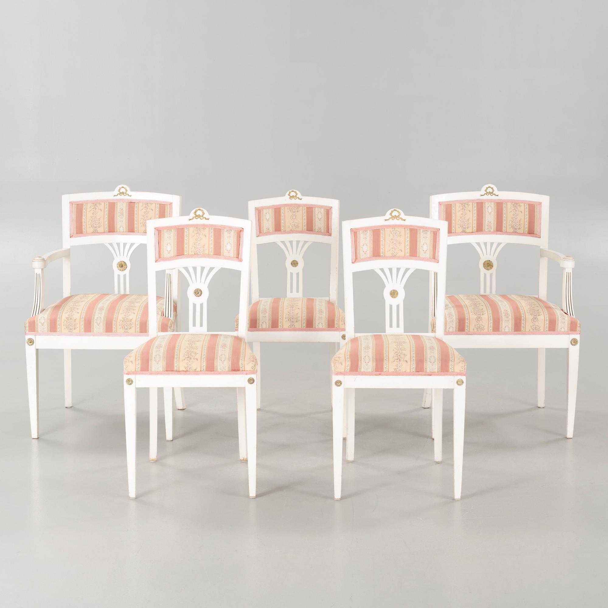 Two gustavian style armchairs and three chairs, first half of the 20th century.